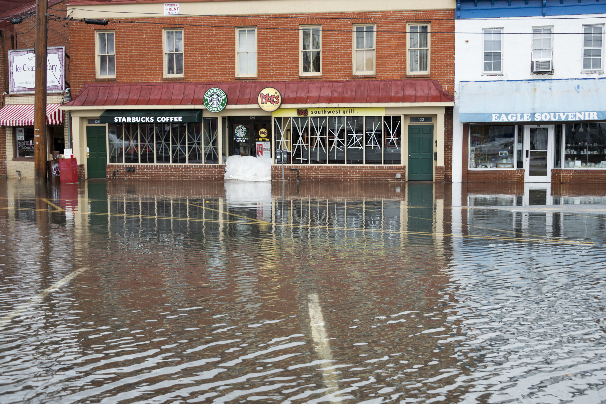 Hurricane Sandy Flood Closes Businesses at Annapolis Harbor Flooded streets in front of business storefronts